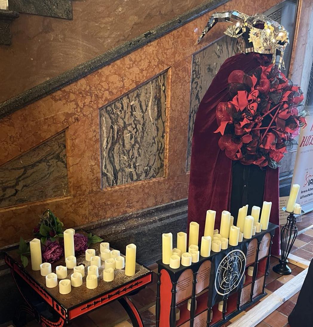 Photo by Laura Belin of the Satanic Temple display at the Iowa state capitol in December 2023